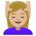 woman getting massage: medium-light skin tone emoji in PNG format