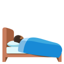 person in bed: medium-dark skin tone emoji in PNG format